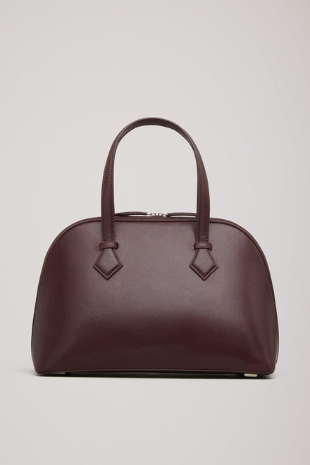 The Harnick Top Handle Bag