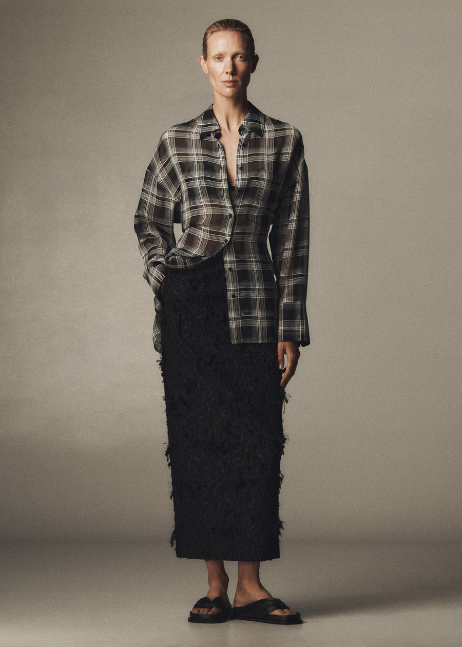 Annely wears the Joyse Sheer Shirt in Black/White Check with the Innes Skirt & Jervis Sandal.