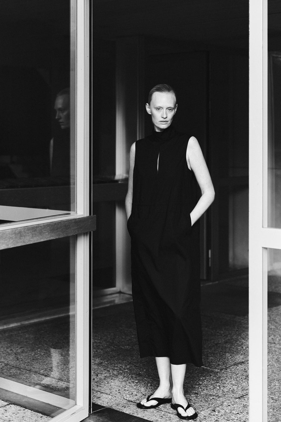 Luca wears the Ezra Dress & the Viola Sandal in Black