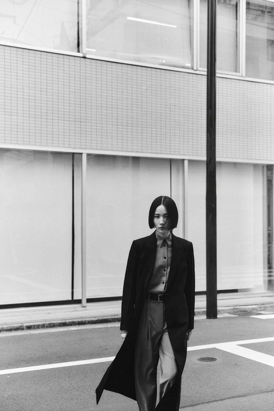 Tsugumi wears the Mylor Long Blazer over the the Philippa Shirt & Goddard Straight Pant in Pumice.