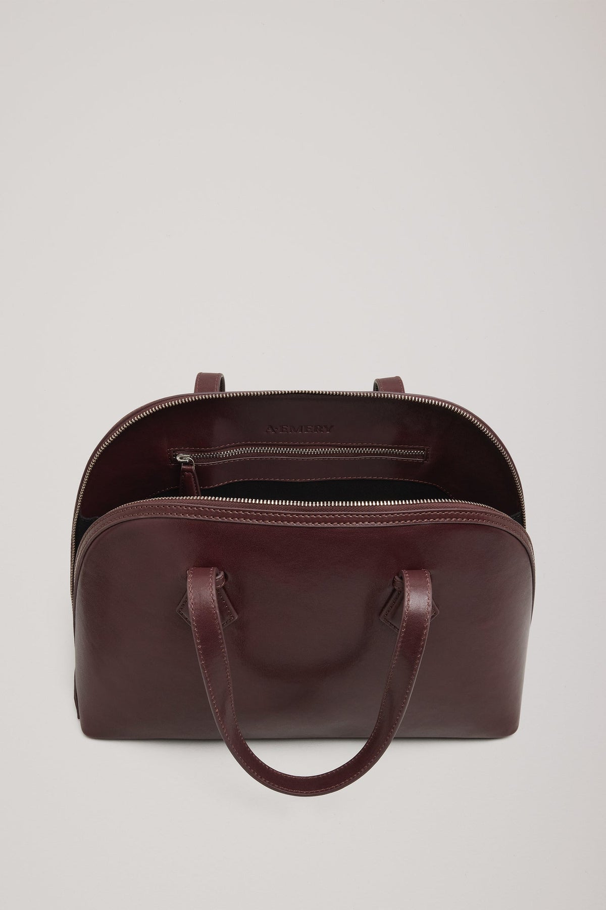 The Harnick Top Handle Bag
